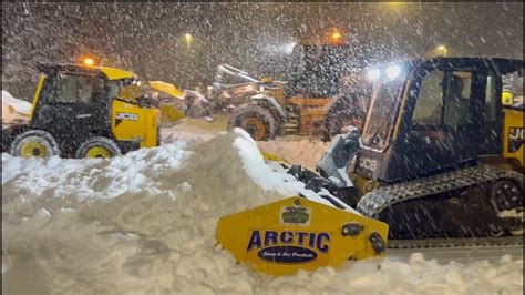 HEAVY EQUIPMENT SNOW PLOWING HEAVY DEEP SNOW